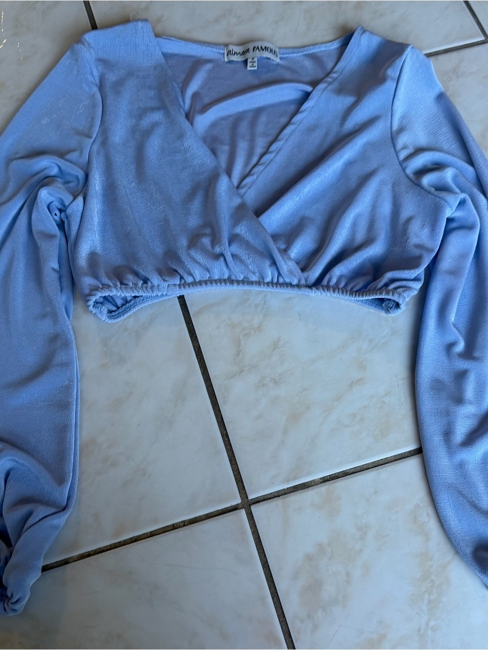 Almost Famous Light Blue Wrap Crop Top with Long Sleeves
